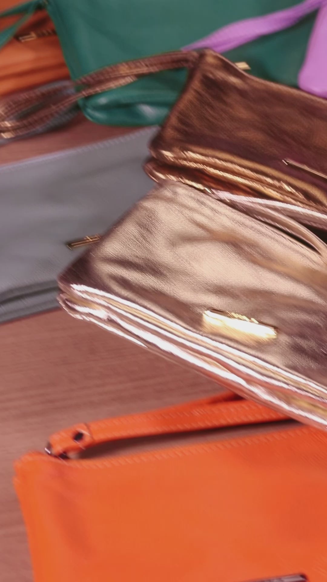 Bolsa Nécessaire Mão Couro Bronze Lia